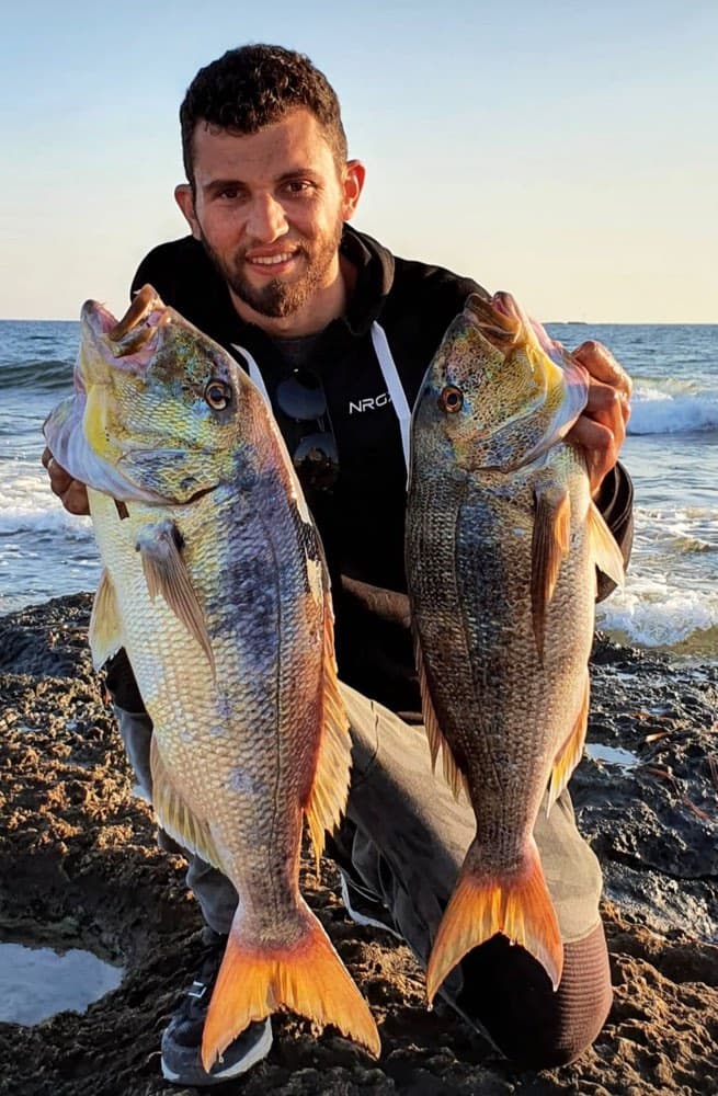 Dimitris Kyriakou fishing from the shore in Greece