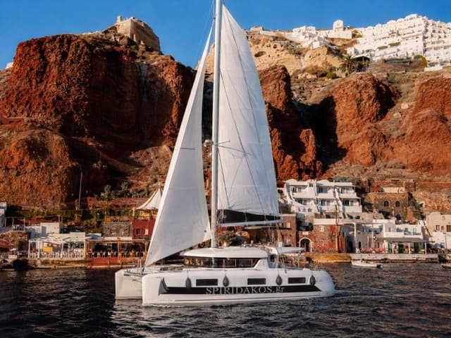 Catamaran Semi-Private Daytime Premium Ammoudi Cruise with BBQ, Open Bar and Transfers — Santorini 1
