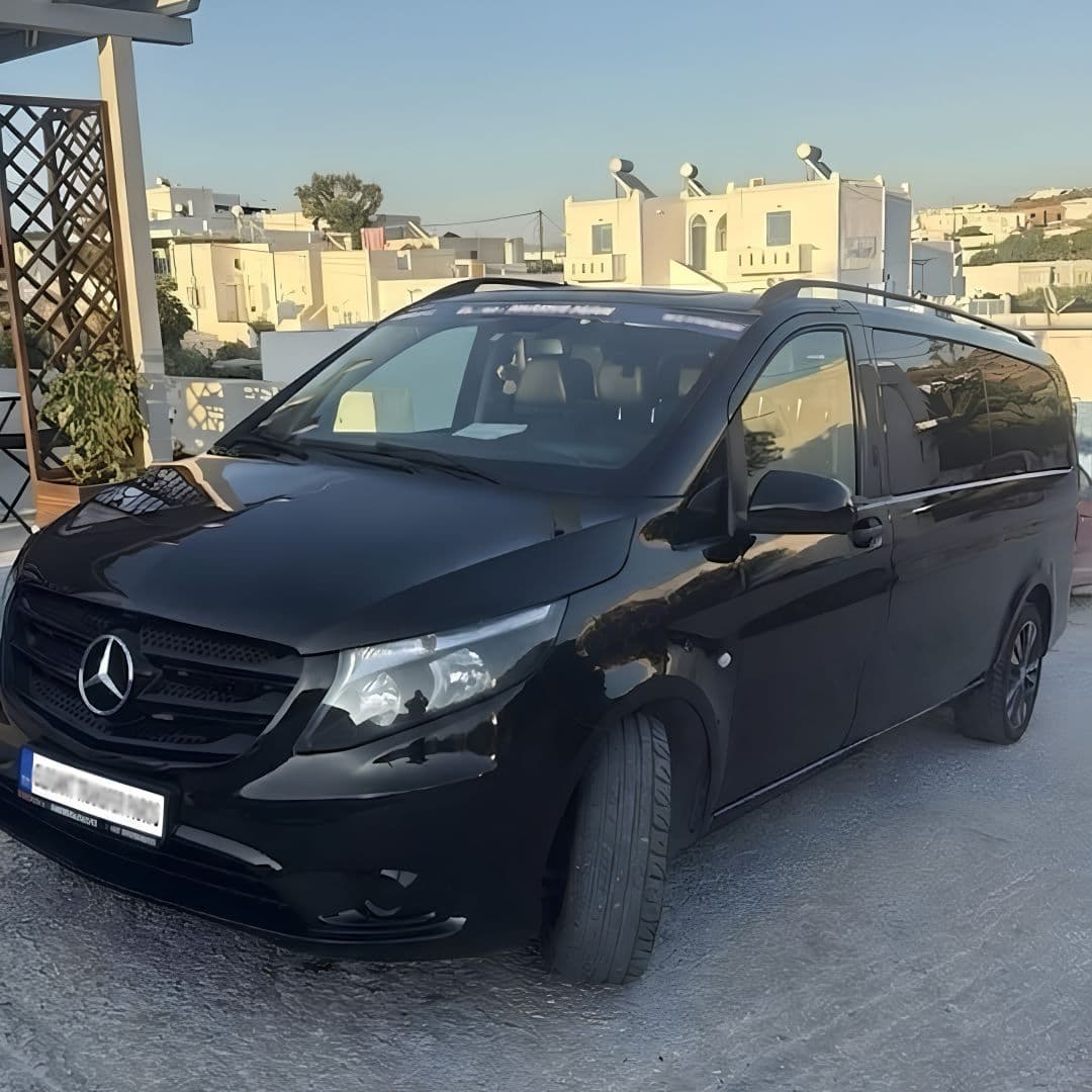 Black Mercedes-Benz passenger van in Paros